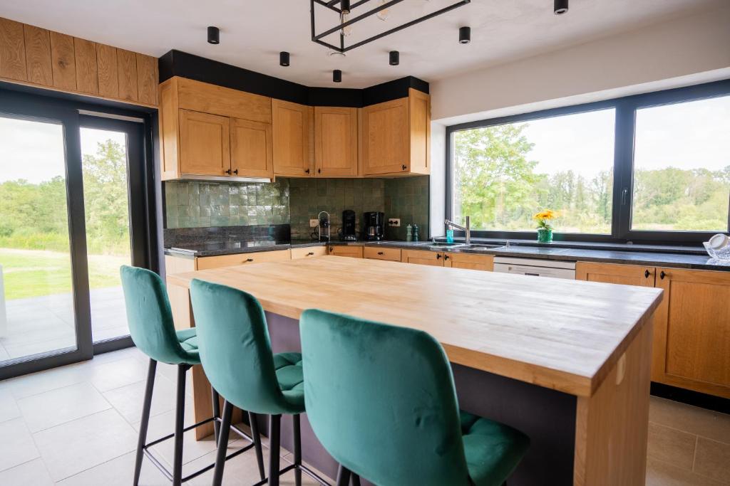 Kuchyň nebo kuchyňský kout v ubytování Chalet Kato - Nieuw! Open vanaf 2 augustus 2024