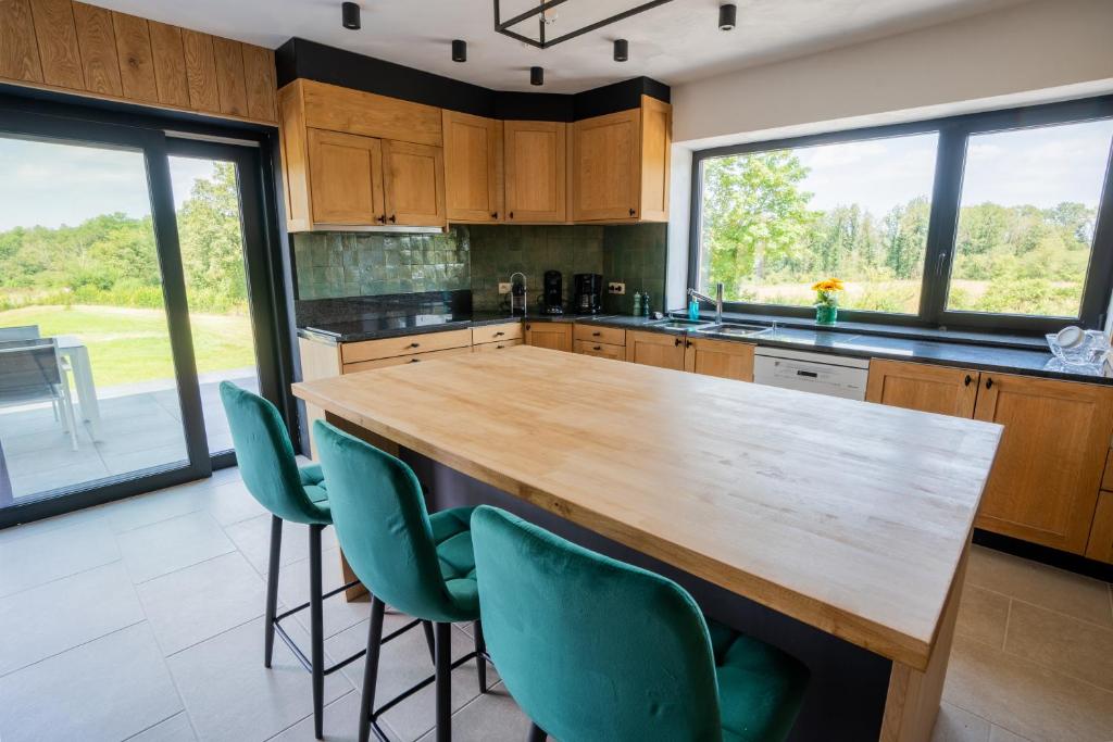 Kuchyň nebo kuchyňský kout v ubytování Chalet Kato - Nieuw! Open vanaf 2 augustus 2024