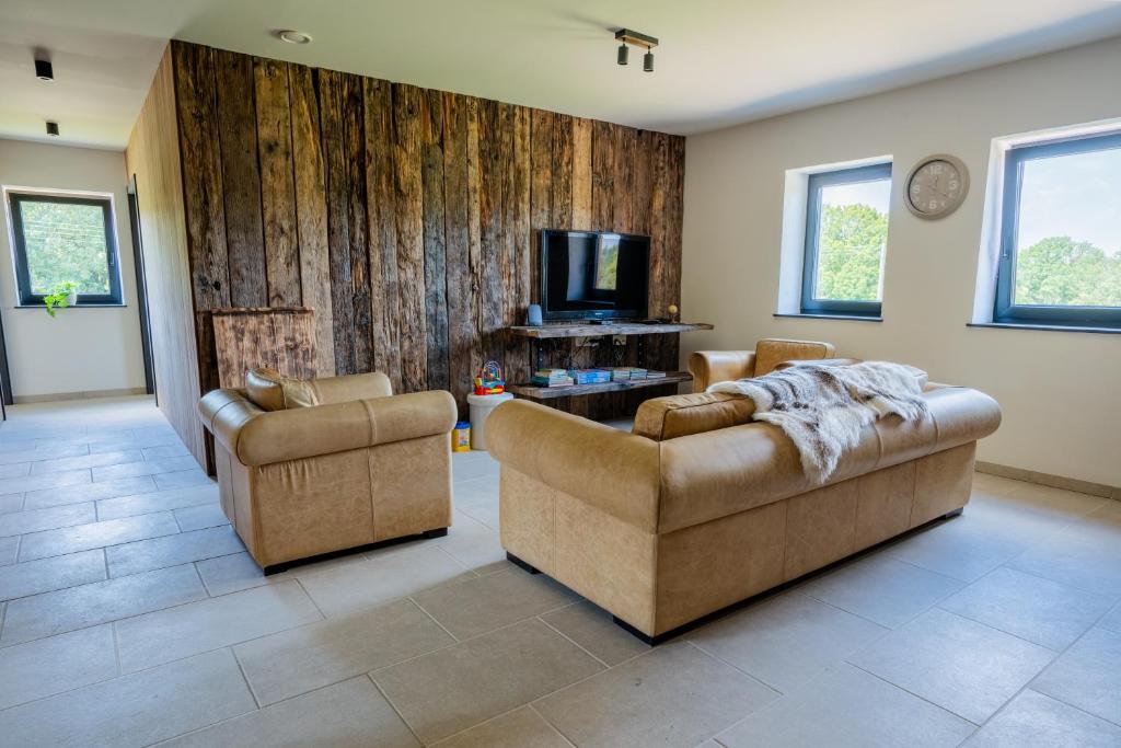 TV a/nebo společenská místnost v ubytování Chalet Kato - Nieuw! Open vanaf 2 augustus 2024