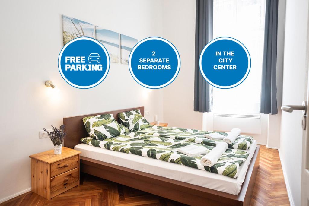 A bed or beds in a room at Free Parking - DOB50 spacious apartment - 2 separate bedroom, 5 people, AC, WIFI