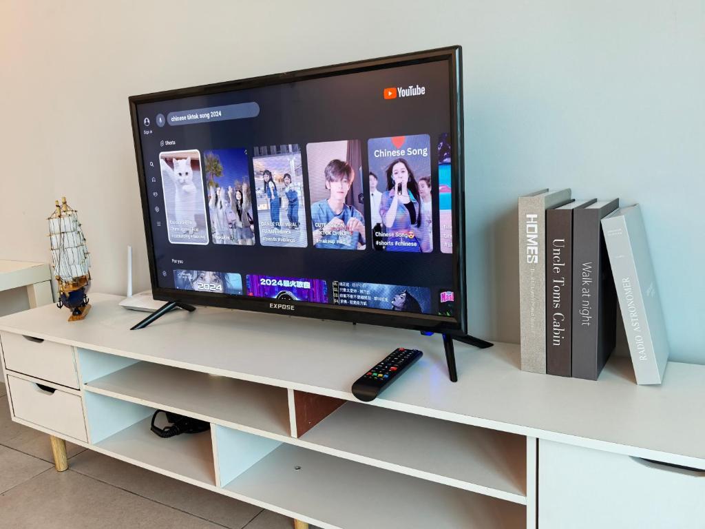 Телевизор и/или развлекательный центр в Meritus Family Comfy Deluxe Home