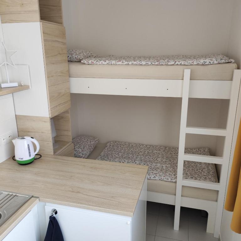 Postel nebo postele na pokoji v ubytování Apartmán Bezruč