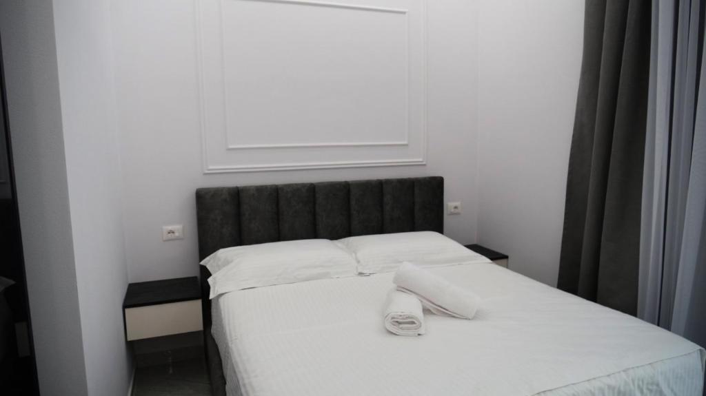 Postel nebo postele na pokoji v ubytování Bar Restorant Hotel Rama