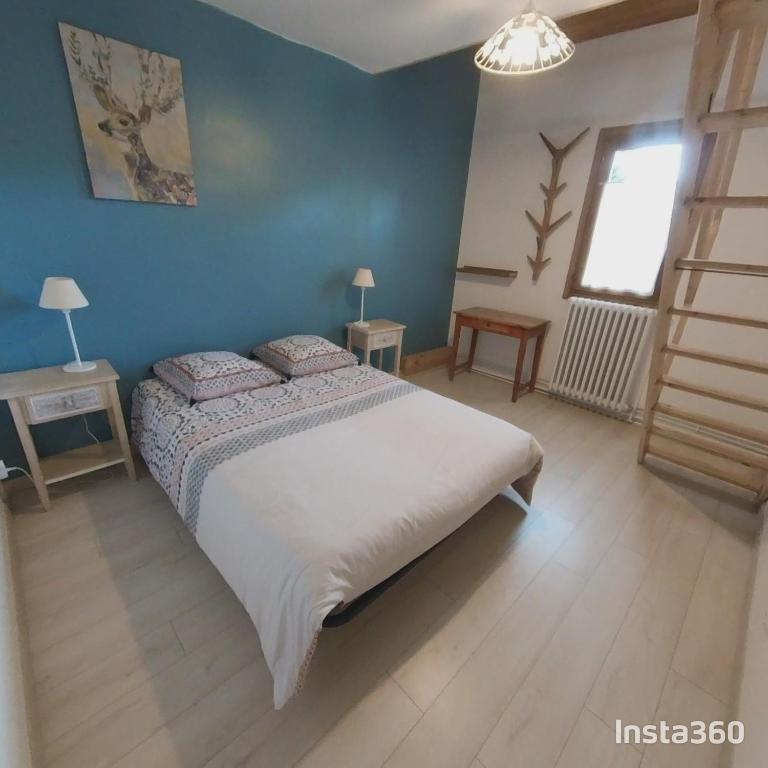 Postel nebo postele na pokoji v ubytování Gîte les Ramiers.