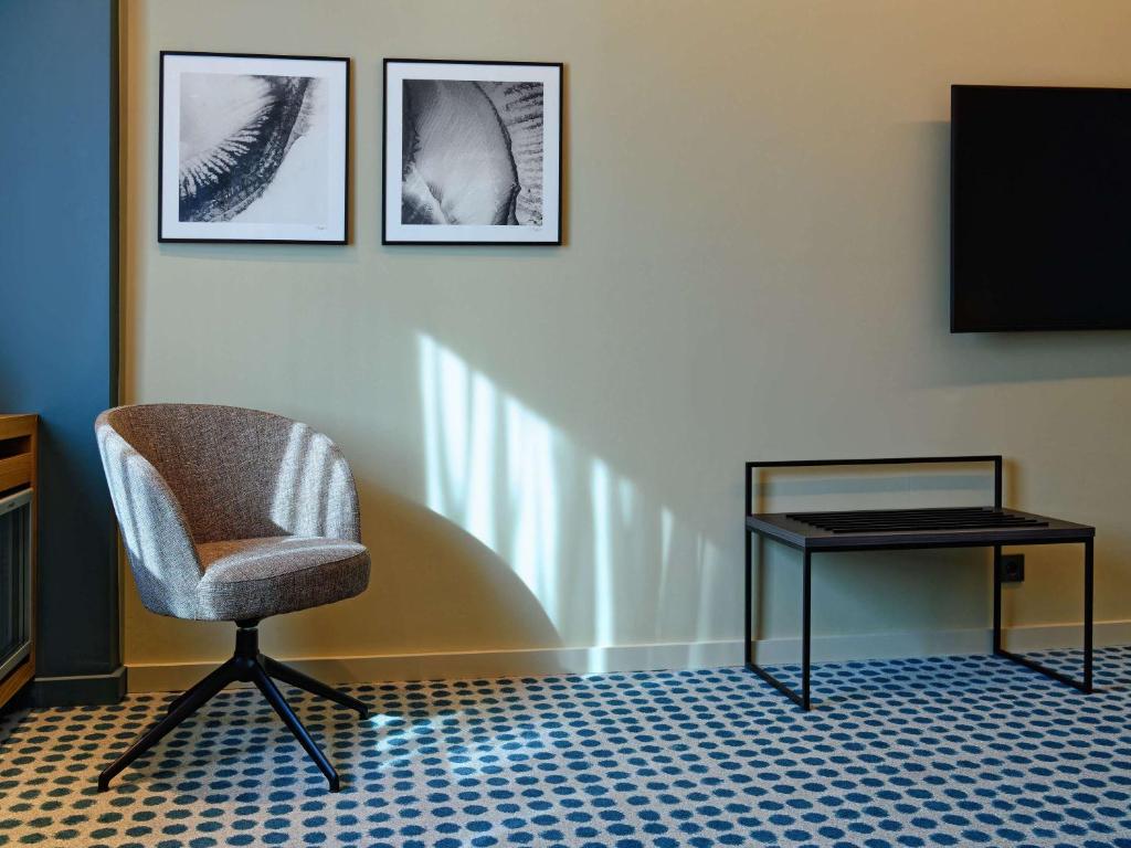 TV a/nebo společenská místnost v ubytování Novotel Luxembourg Kirchberg