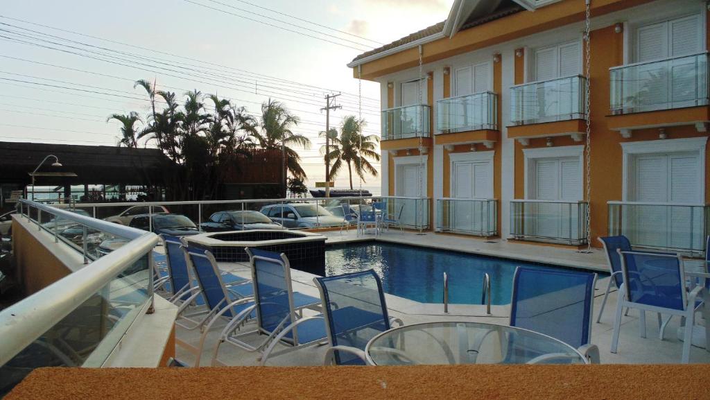 A piscina localizada em Juquei Frente ao Mar Hotel Pousada ou nos arredores