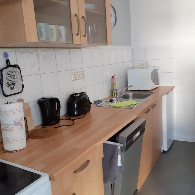 Kuchyň nebo kuchyňský kout v ubytování Ferienwohnung Zum Lederbernd
