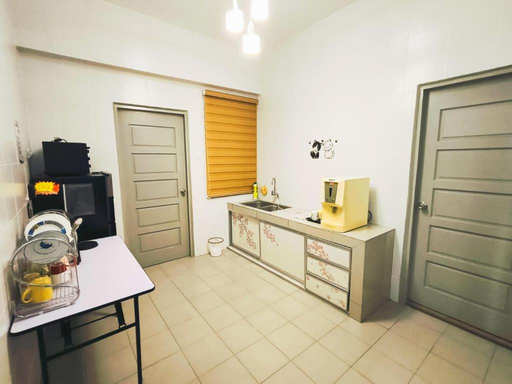 Kuchyň nebo kuchyňský kout v ubytování The Venus Block B31st floor Sri Manjung