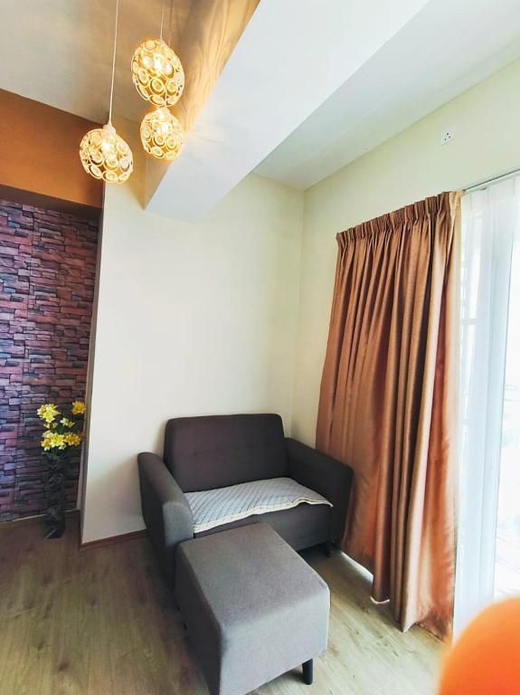 Posezení v ubytování The Venus Block B31st floor Sri Manjung