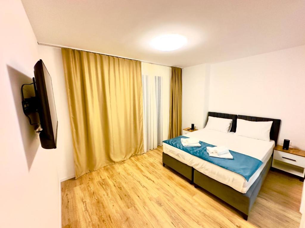 Postel nebo postele na pokoji v ubytování Hotel MM Residence