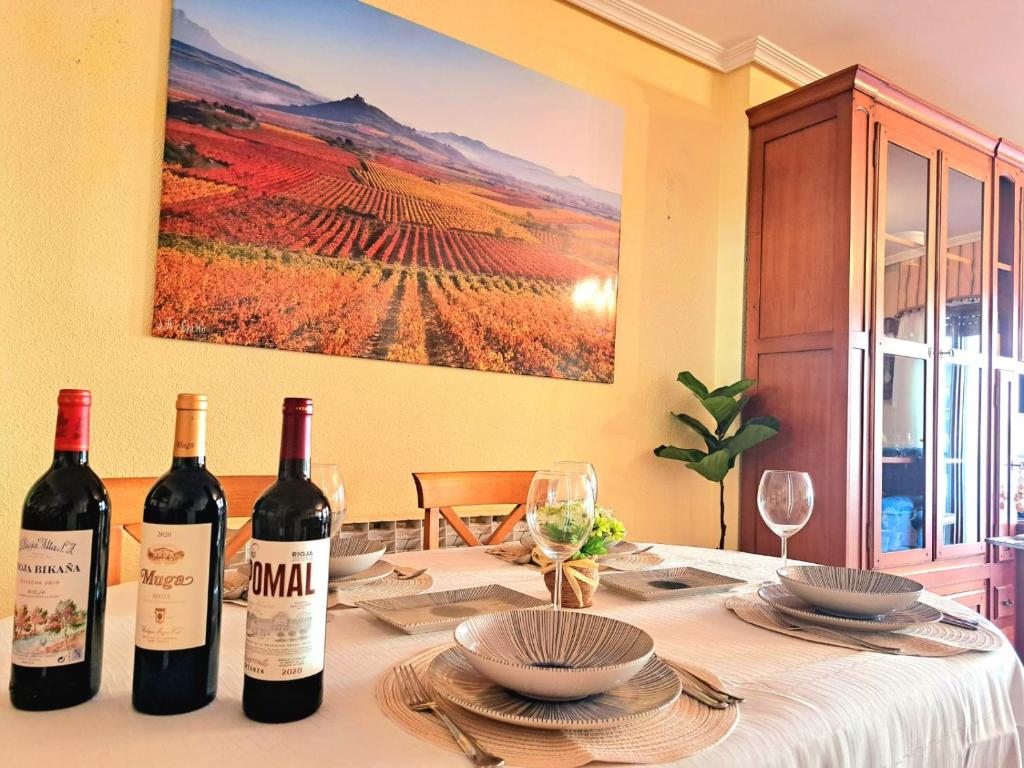 a table with two bottles of wine on it at GarnachasBlancas in Haro