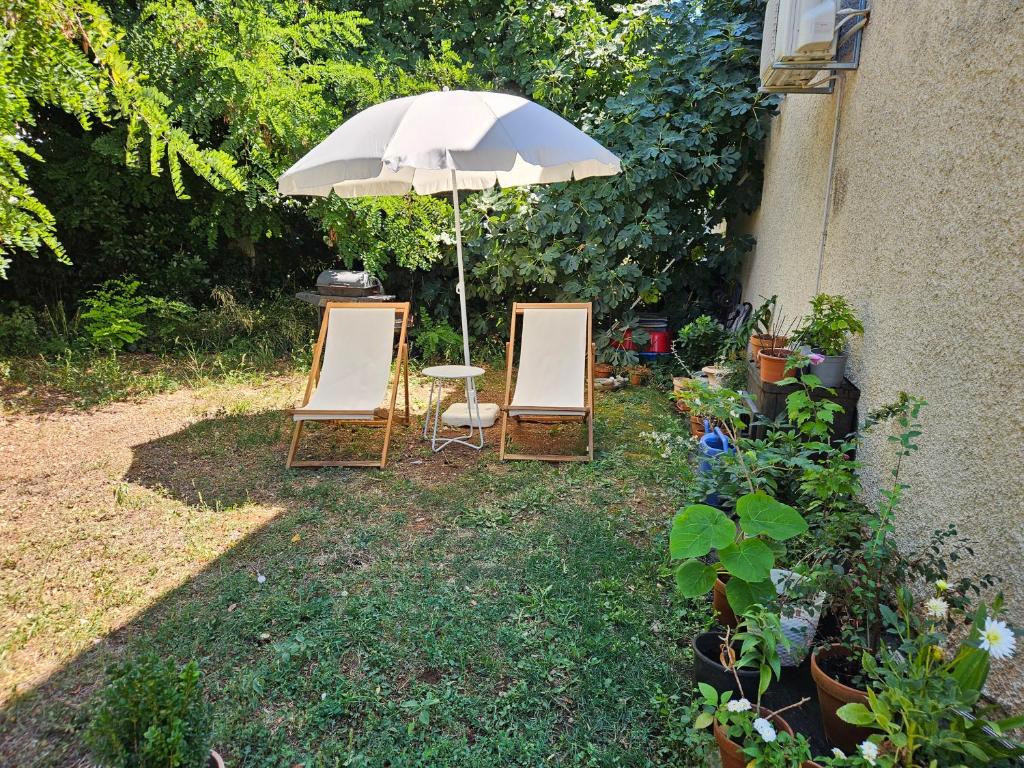 Vonkajšia záhrada v ubytovaní Apartment for two