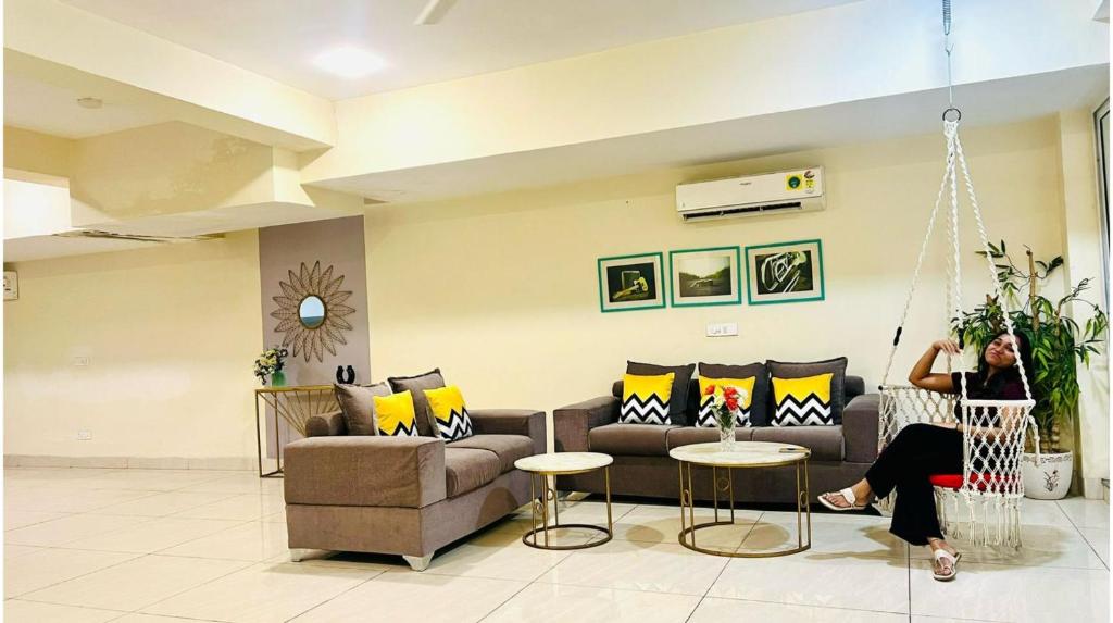Posezení v ubytování Olive Service Apartments - Golf Course Road