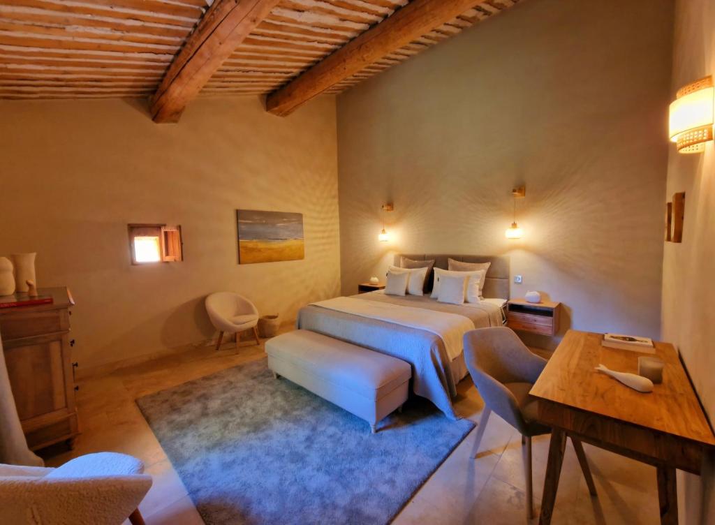 Postel nebo postele na pokoji v ubytování Bastide des 7 Sœurs