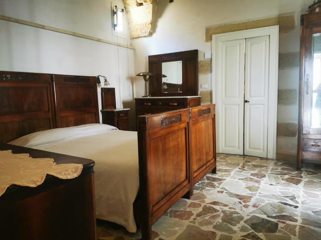 Postel nebo postele na pokoji v ubytování Casa del Glicine Andrano