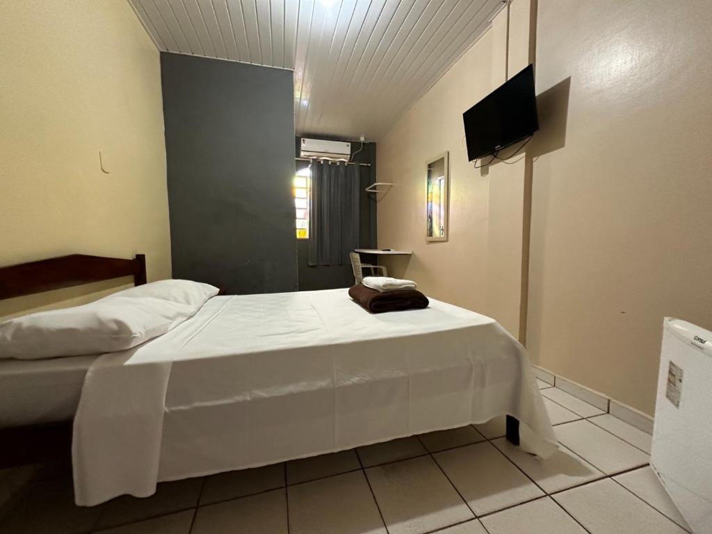 Xenius Hotel - Apt Particular客房内的一张或多张床位