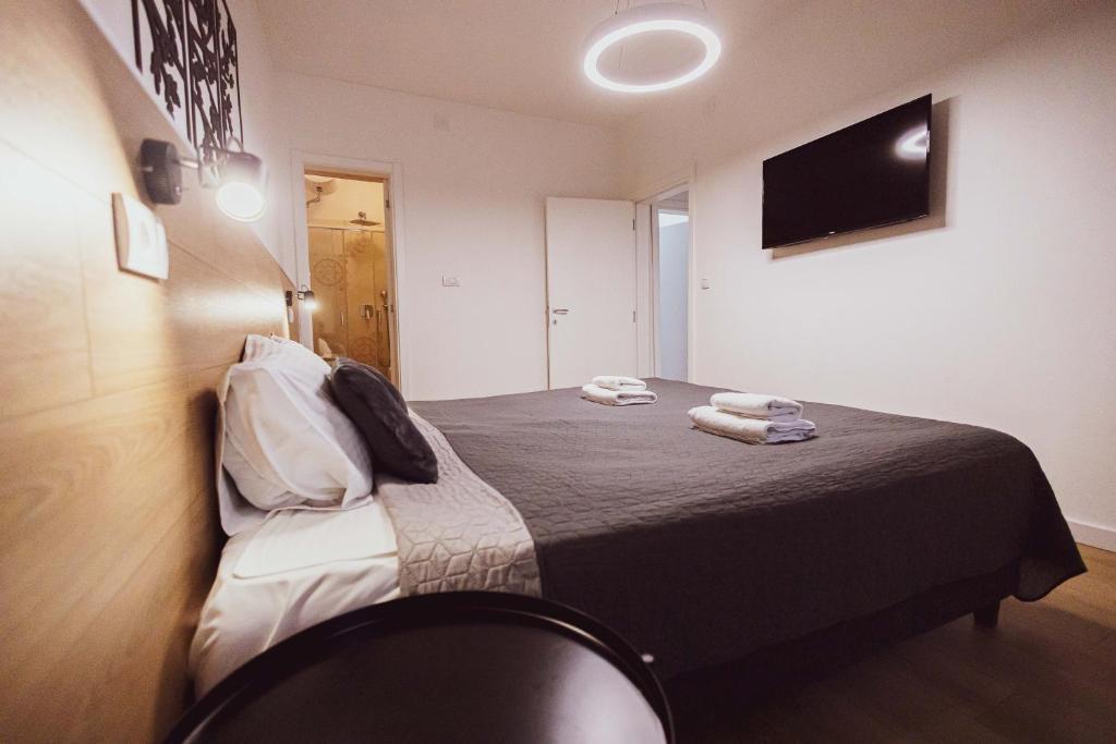 Televiisor ja/või meelelahutuskeskus majutusasutuses BG Exclusive Suites
