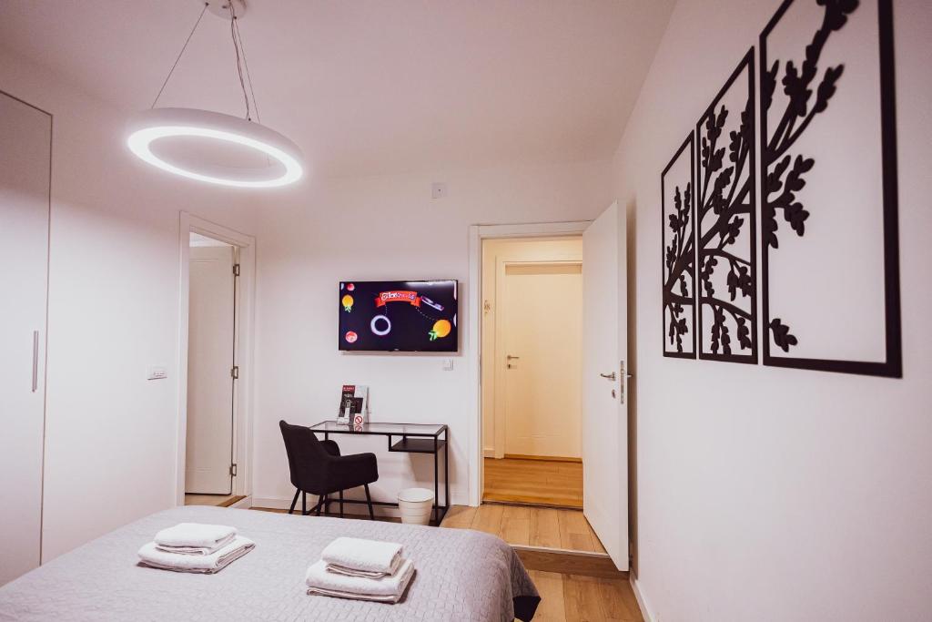 Televiisor ja/või meelelahutuskeskus majutusasutuses BG Exclusive Suites