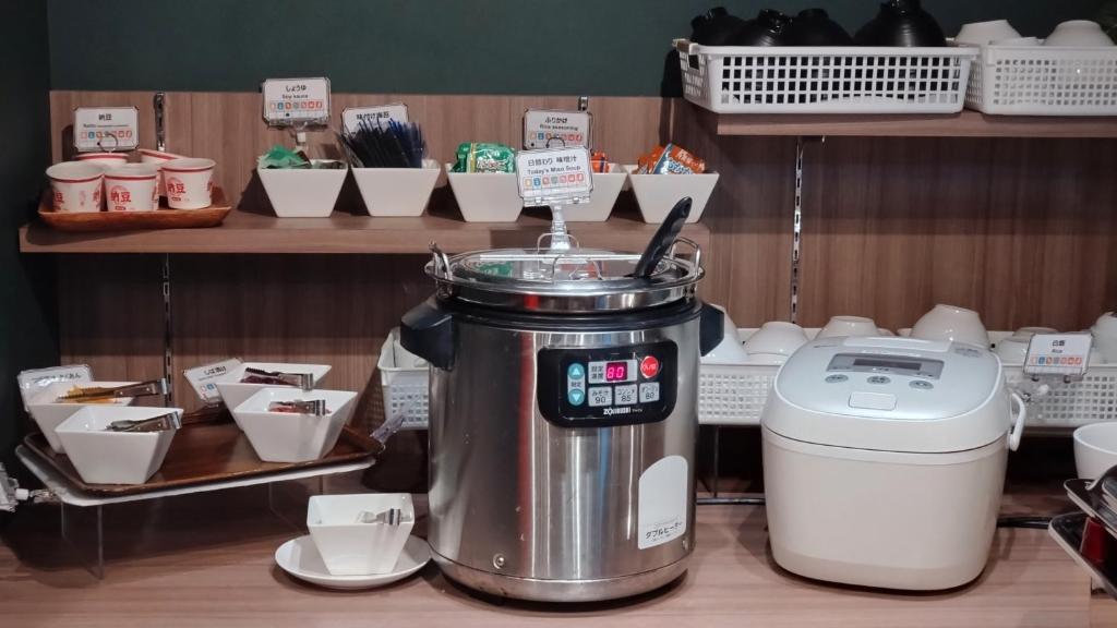 a coffee maker on a counter in a store at Henn na Hotel Tokyo Akasaka in Tokyo
