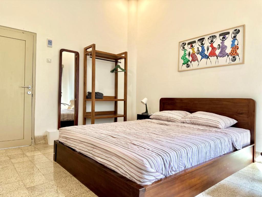 Postel nebo postele na pokoji v ubytování Ijen Haus