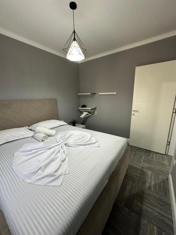 Postel nebo postele na pokoji v ubytování L&A Luxury Apartments