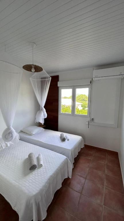 Postel nebo postele na pokoji v ubytování Appartement T3 proche de la mer