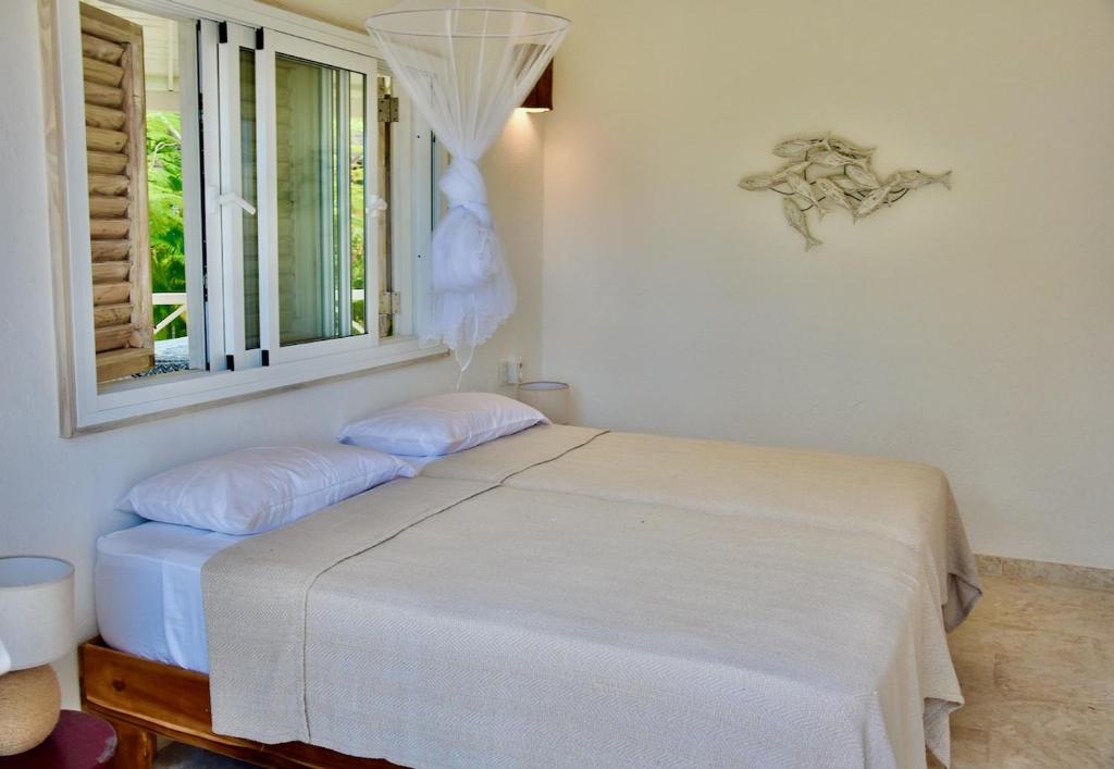 Una cama o camas en una habitación de JandalaVillage