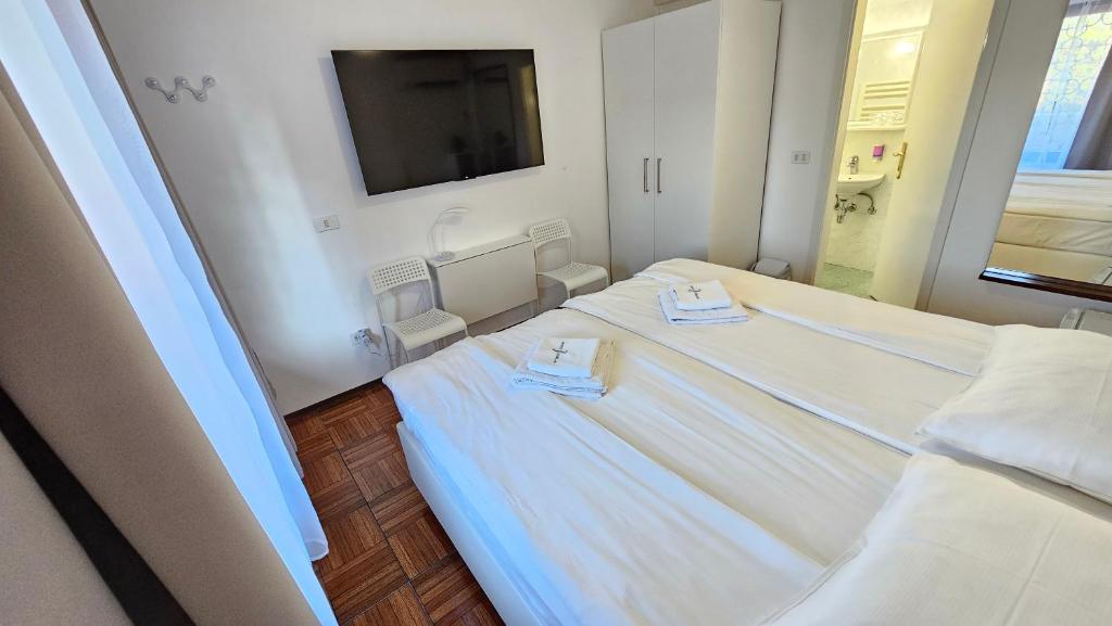 Postel nebo postele na pokoji v ubytování Rooms Koblar