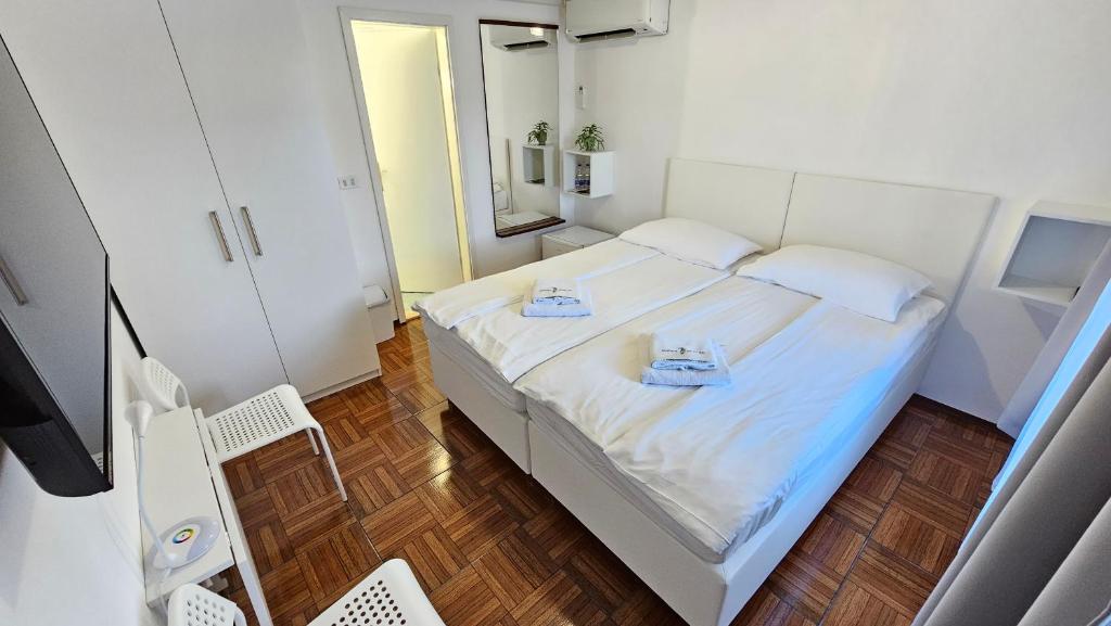 Postel nebo postele na pokoji v ubytování Rooms Koblar