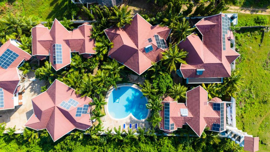 an overhead view of a house with a swimming pool at Almasi in Ukunda