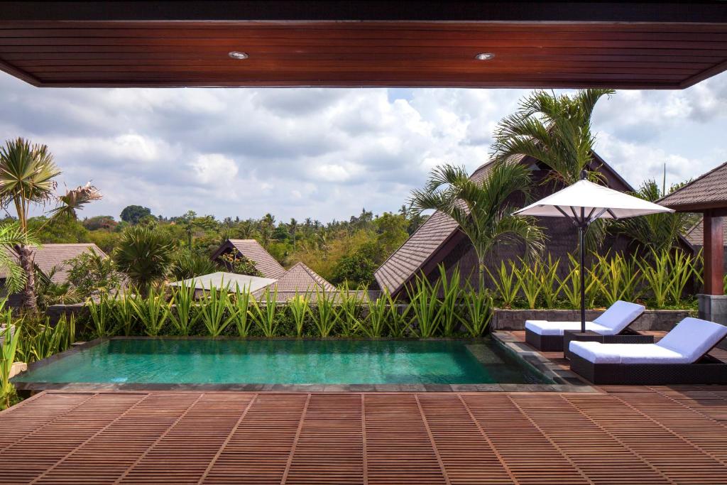 Bazén v ubytování Sanctoo Suites & Villas nebo v jeho okolí