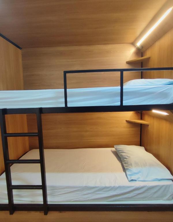 Postel nebo postele na pokoji v ubytování Hostel Casarão 65