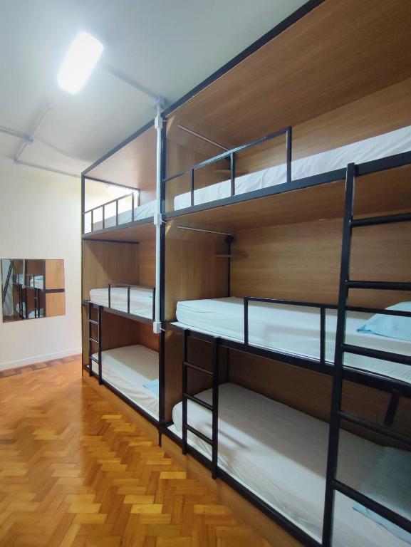 Postel nebo postele na pokoji v ubytování Hostel Casarão 65