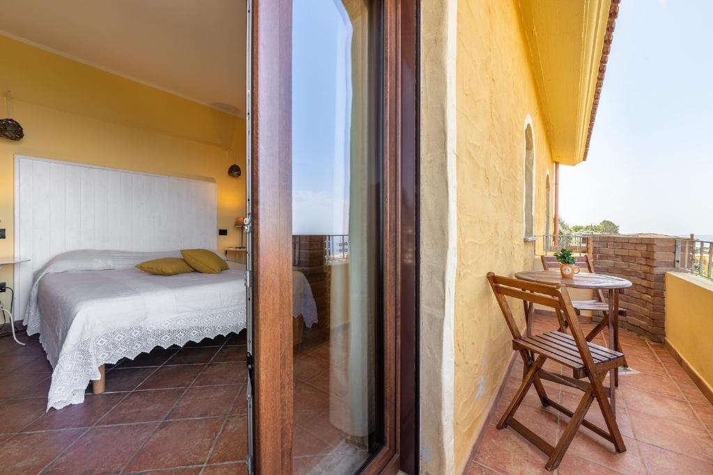 Postel nebo postele na pokoji v ubytování B&B Pedra Rubia