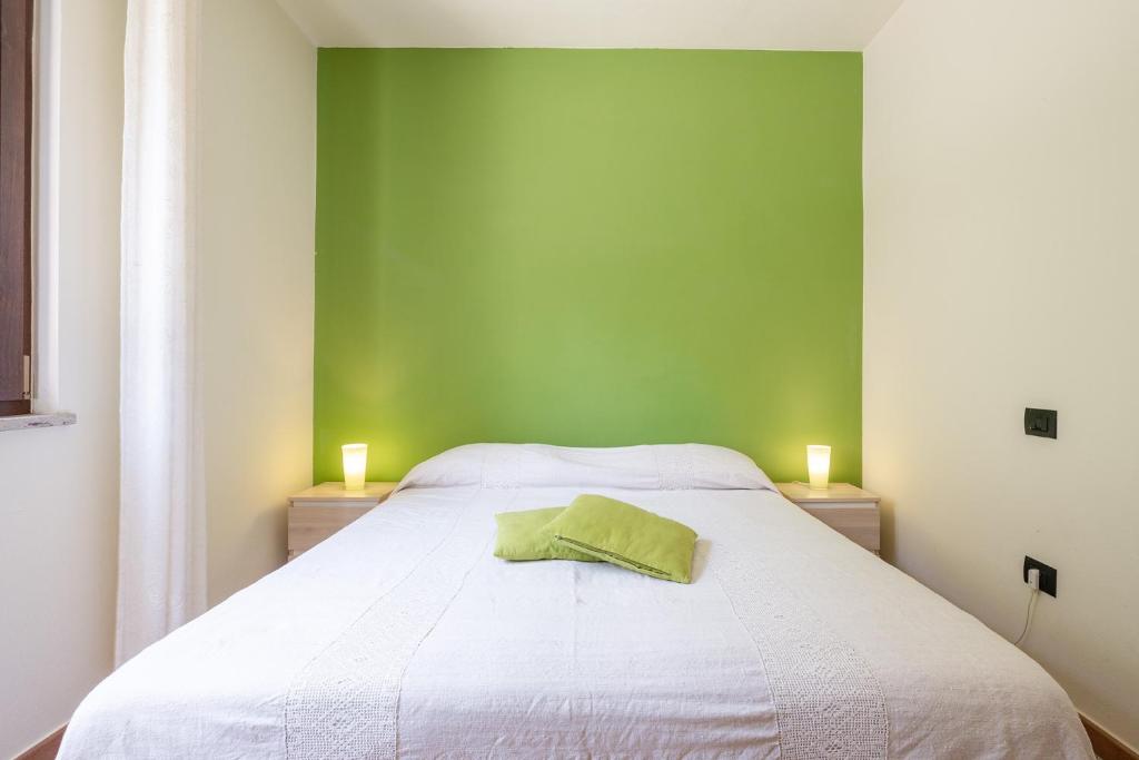 Postel nebo postele na pokoji v ubytování B&B Pedra Rubia