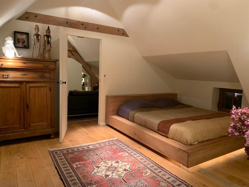 Postel nebo postele na pokoji v ubytování De boerderij van Toon en Jeroen