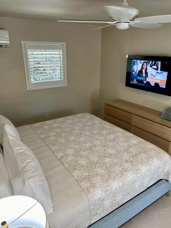 Letto o letti in una camera di Sunshine Island Inn - Adults only