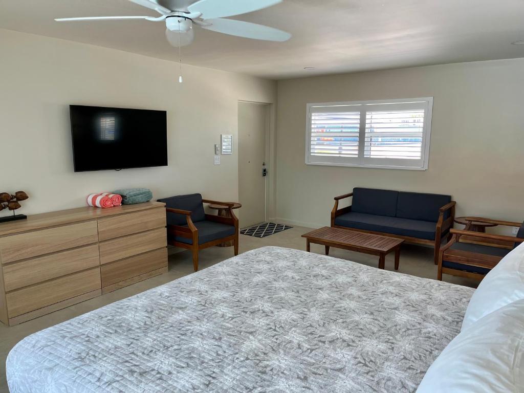 TV o dispositivi per l'intrattenimento presso Sunshine Island Inn - Adults only