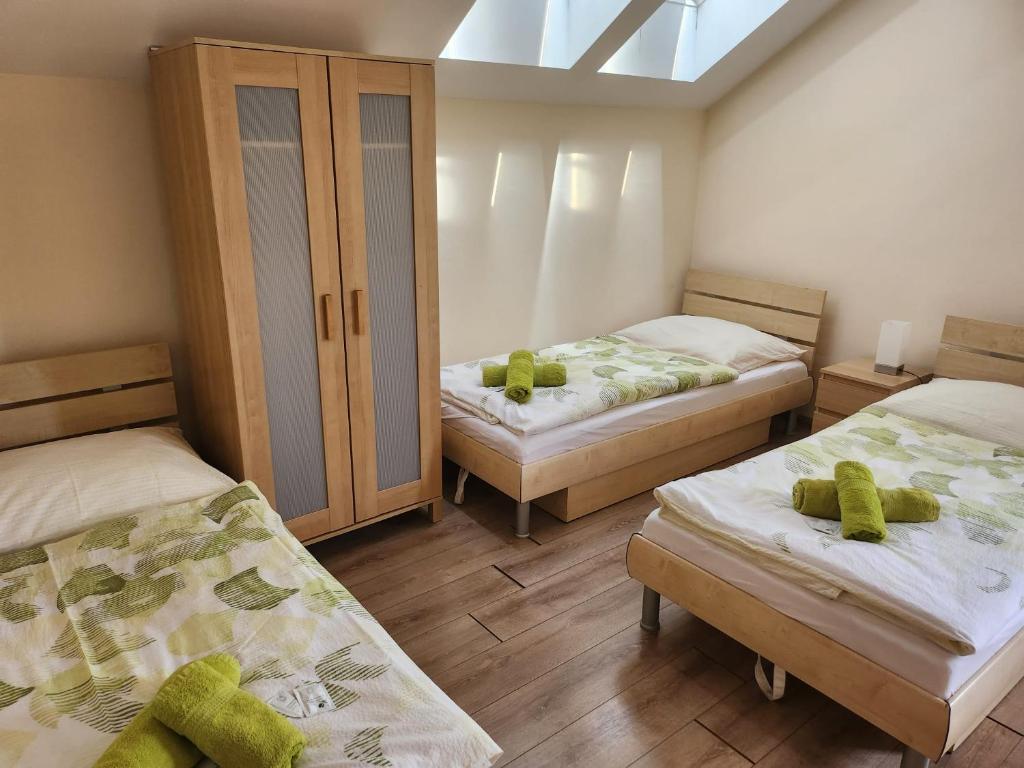 Postel nebo postele na pokoji v ubytování Penzión Daniel
