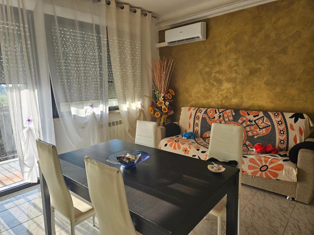 A seating area at Appartamento Divino Tramonto