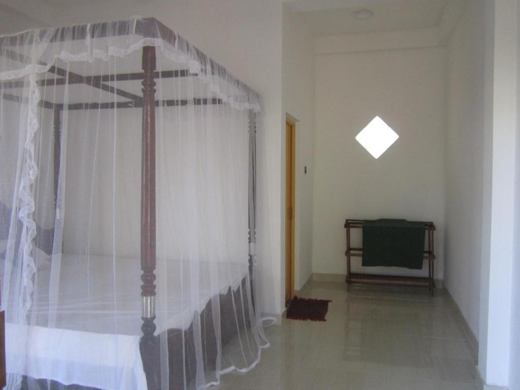 Postel nebo postele na pokoji v ubytování Serene Niche