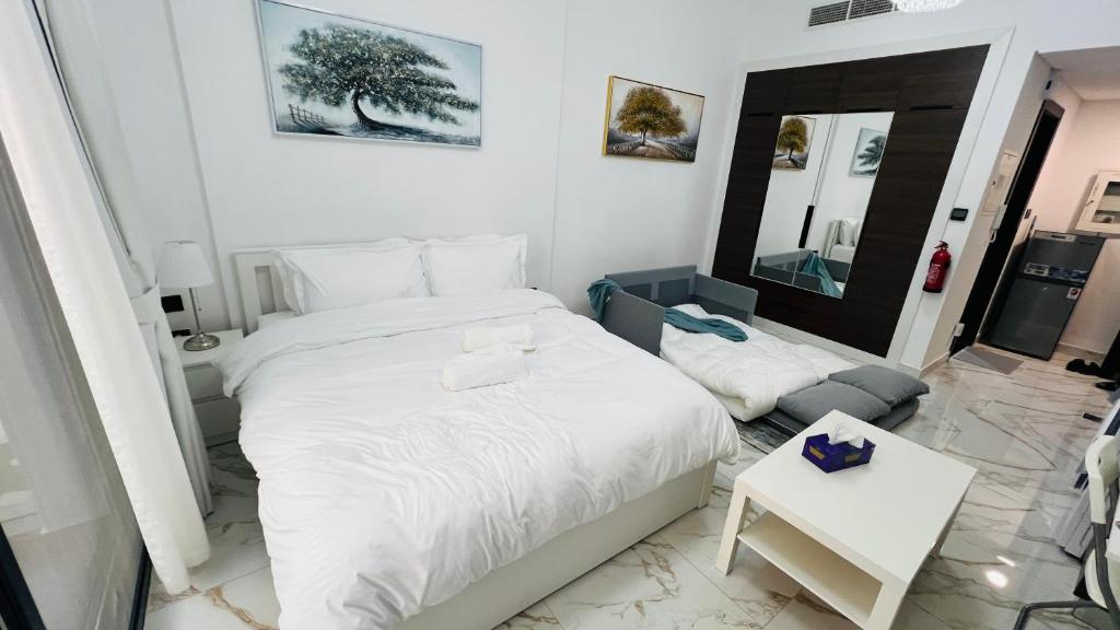 لابی و فضای عمومی Olivz Residence Furnished Cozy Studio Apartment - تصویر ۵