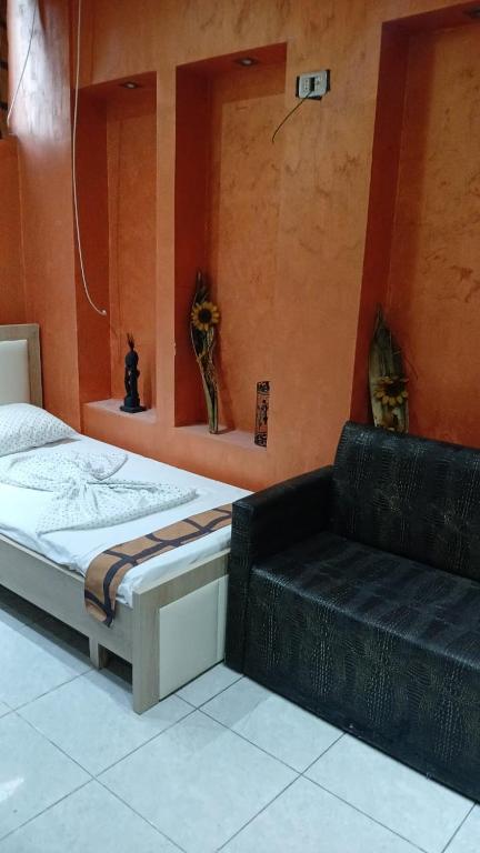 Postel nebo postele na pokoji v ubytování Hotel Hostel J'adore