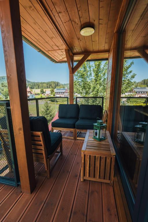 Balkón nebo terasa v ubytování Natur Resort Jetřichovice