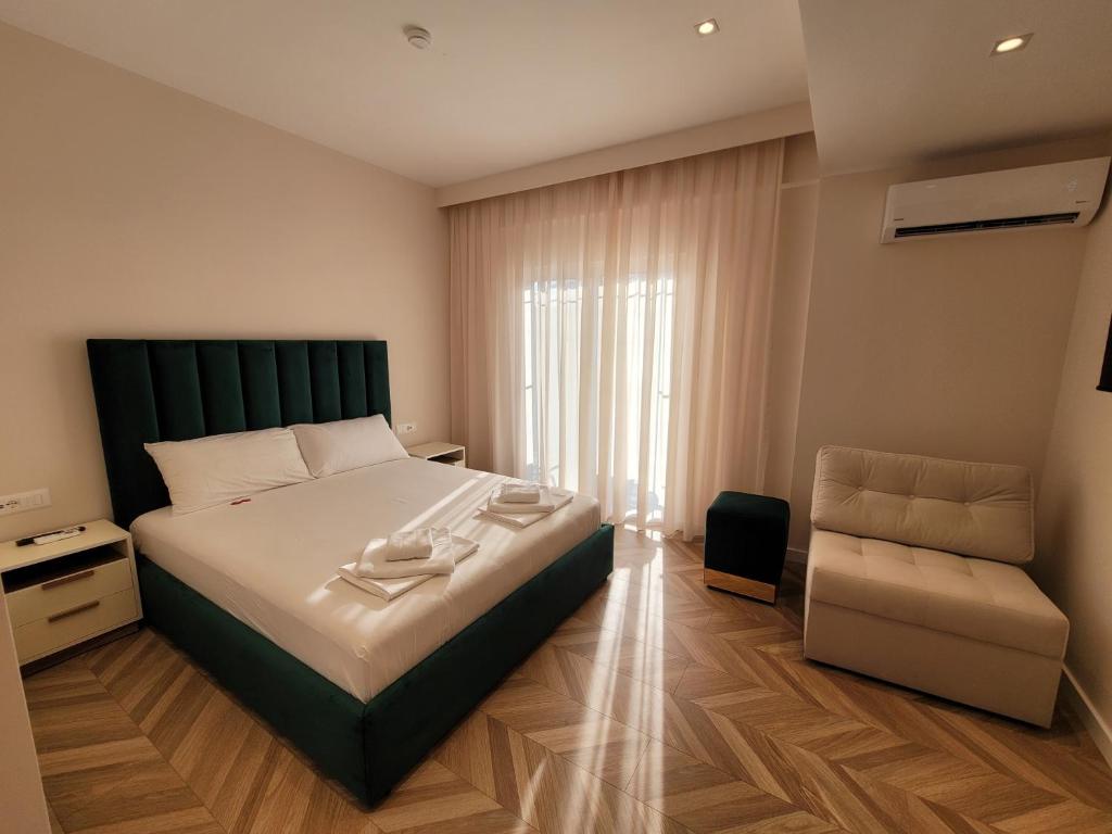 Postel nebo postele na pokoji v ubytování Almar Boutique Hotel