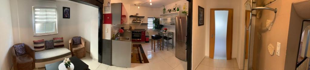 Kuchyň nebo kuchyňský kout v ubytování Seven‘S Apartments I