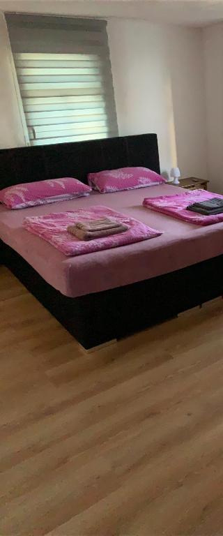 Postel nebo postele na pokoji v ubytování Seven‘S Apartments I