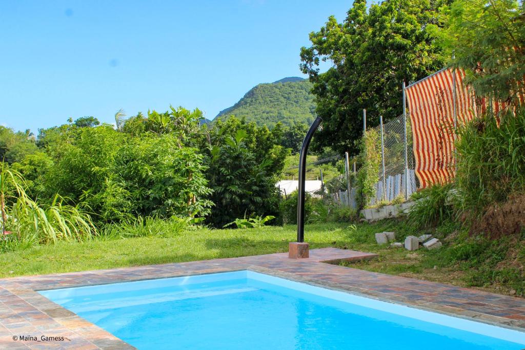 Bazén v ubytování Bas de villa F2 neuf avec terrasse et piscine nebo v jeho okolí