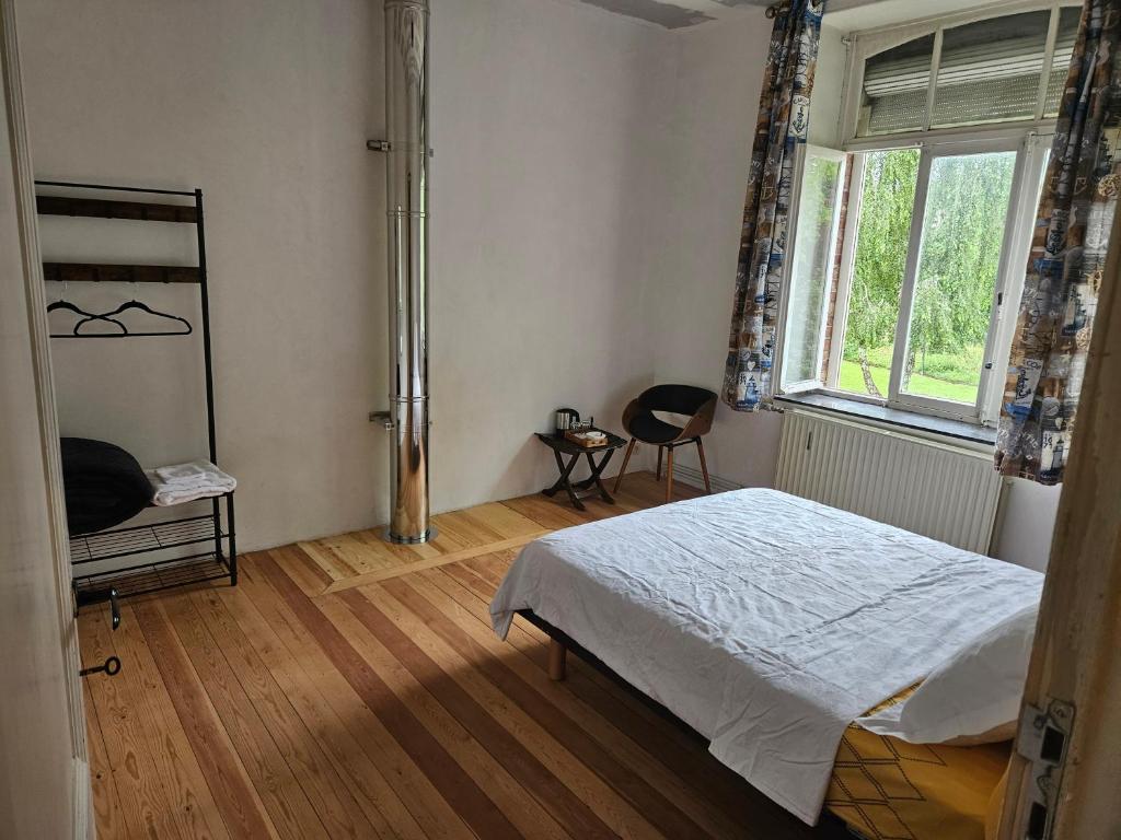 Postel nebo postele na pokoji v ubytování Mam'Ika