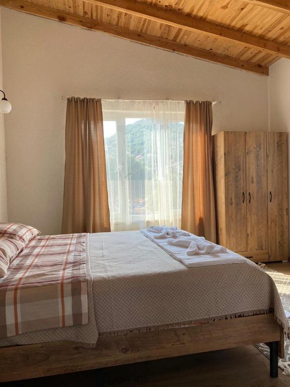 Postel nebo postele na pokoji v ubytování Galabaapart
